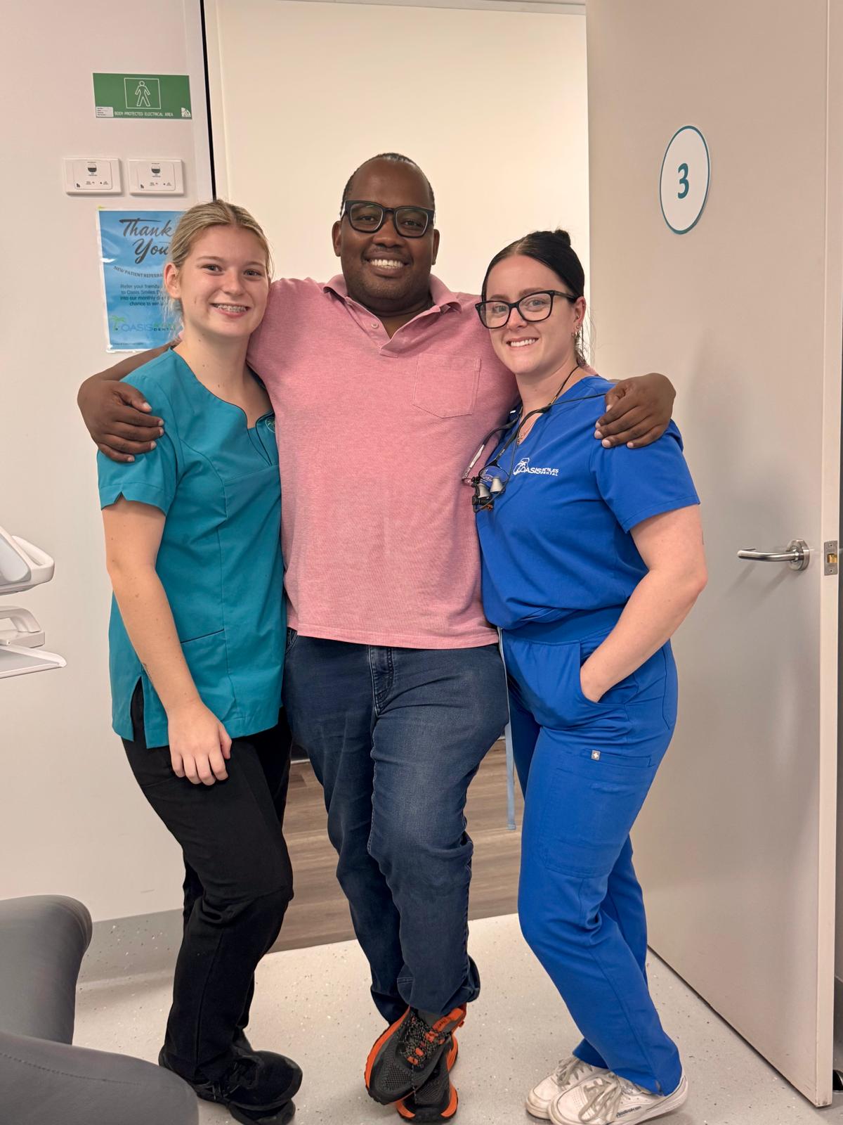 Dr Daniel with the Oasis Smiles team